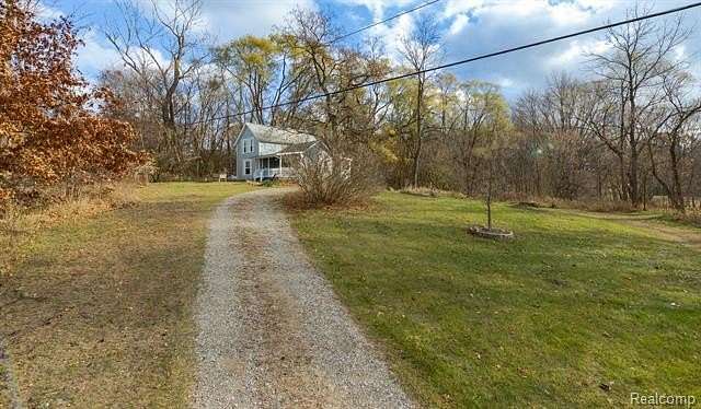 2.42 Acres of Residential Land with Home for Sale in Holly, Michigan