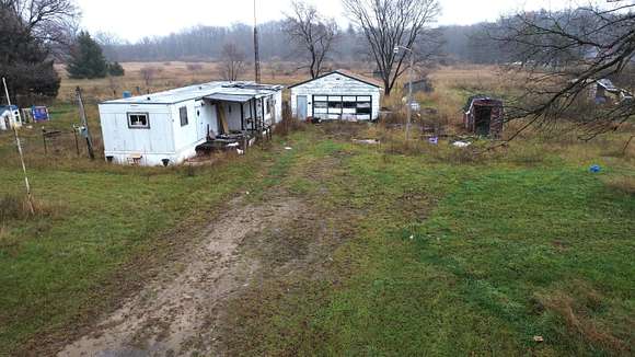 10 Acres of Recreational Land with Home for Sale in Hesperia, Michigan