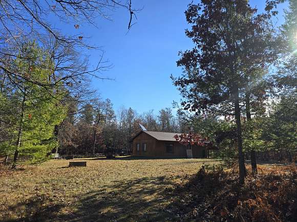 10 Acres of Recreational Land with Home for Sale in Curran, Michigan