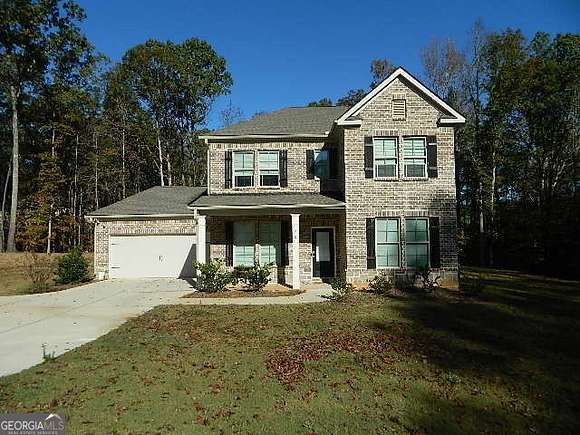 2.61 Acres of Residential Land with Home for Sale in Ellenwood, Georgia