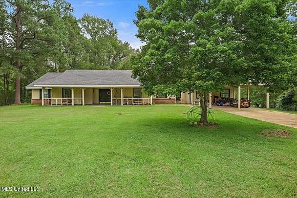 5.93 Acres of Residential Land with Home for Sale in Raymond, Mississippi