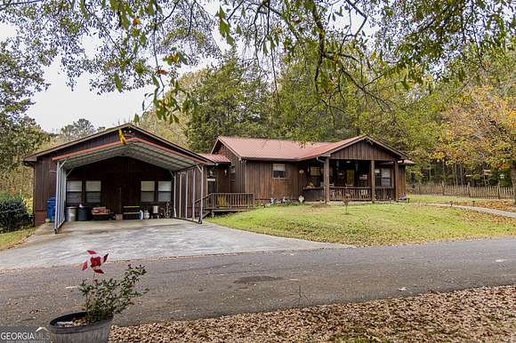 68.6 Acres of Agricultural Land with Home for Sale in Rome, Georgia