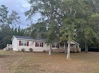 9.4 Acres of Residential Land with Home for Sale in Columbia, Alabama