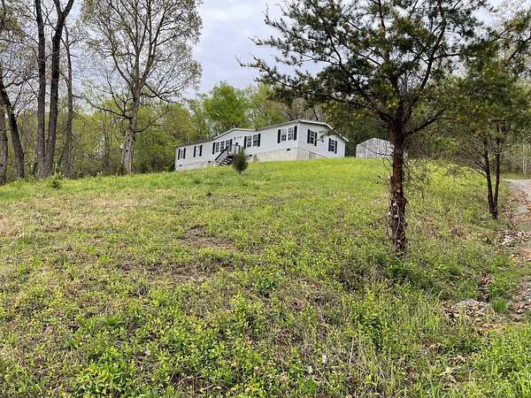 5.2 Acres of Residential Land with Home for Sale in Dandridge, Tennessee