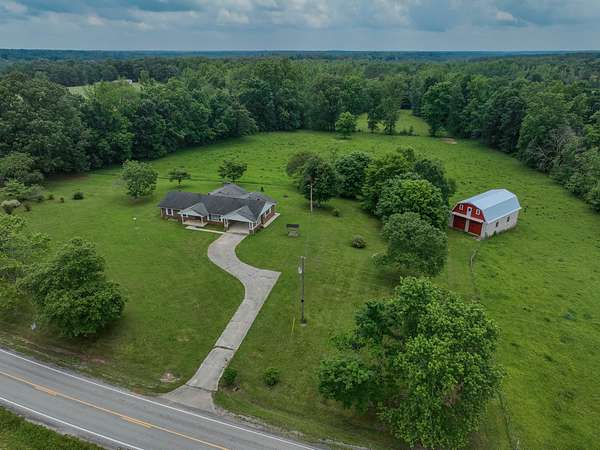 7.5 Acres of Land with Home for Sale in Iron City, Tennessee