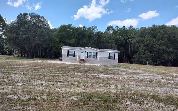 5 Acres of Land with Home for Sale in McAlpin, Florida