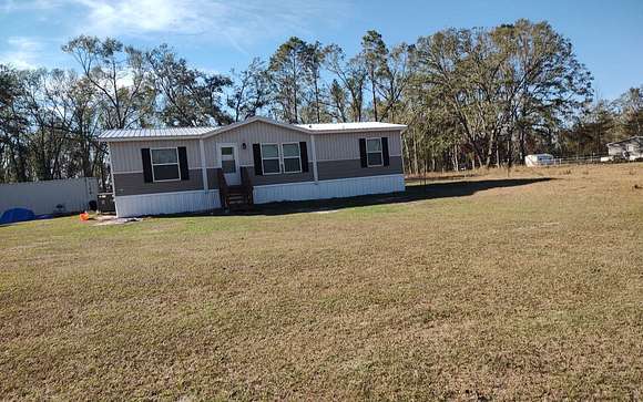 5 Acres of Land with Home for Sale in McAlpin, Florida