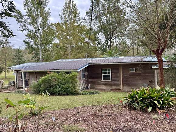 6.5 Acres of Residential Land with Home for Sale in Chipley, Florida