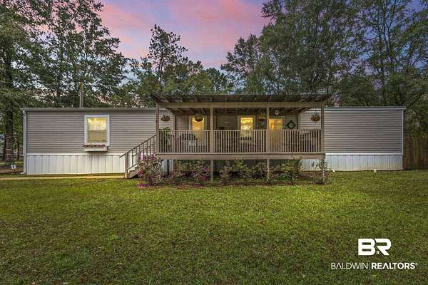 5.5 Acres of Land with Home for Sale in Robertsdale, Alabama