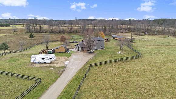 21.67 Acres of Agricultural Land with Home for Sale in Paris, Michigan