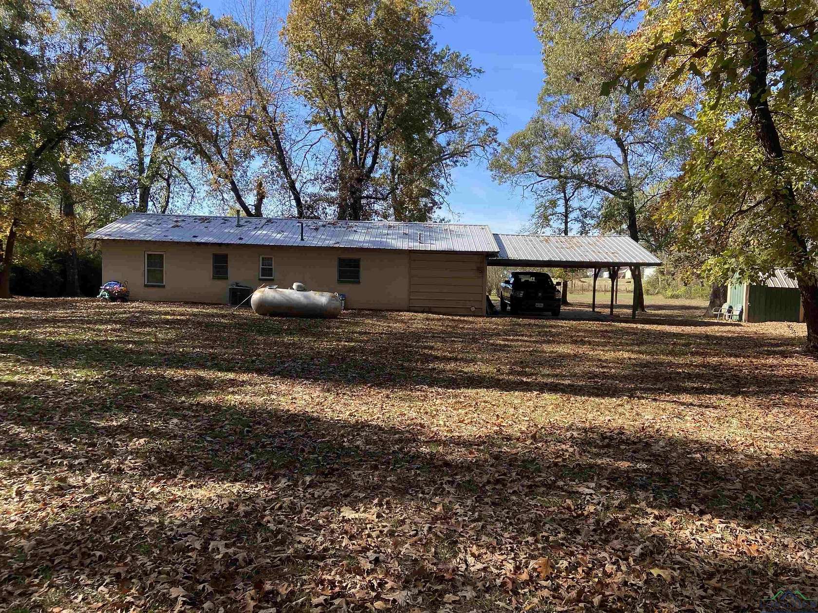 2.527 Acres of Residential Land with Home for Sale in Powderly, Texas