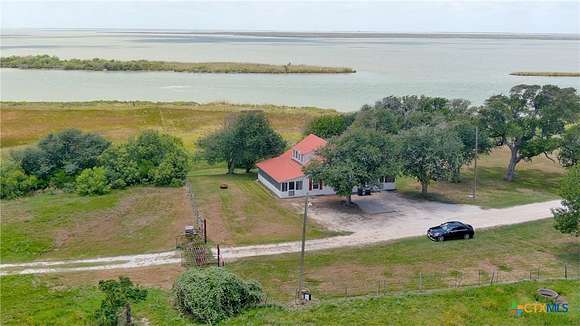 582.15 Acres of Agricultural Land with Home for Sale in Seadrift, Texas