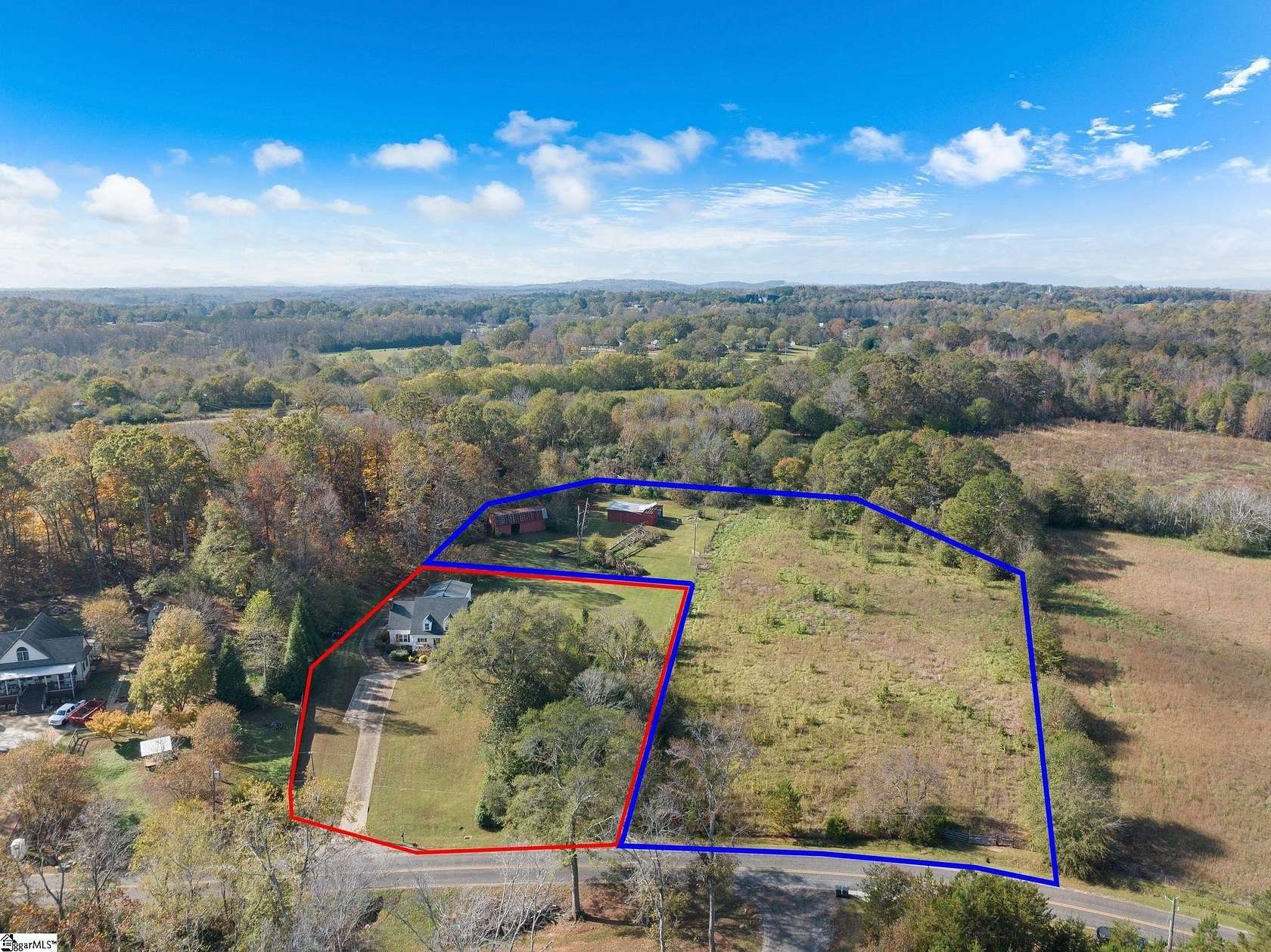 5.8 Acres of Residential Land with Home for Sale in Taylors, South Carolina