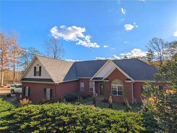 4.04 Acres of Residential Land with Home for Sale in Braselton, Georgia