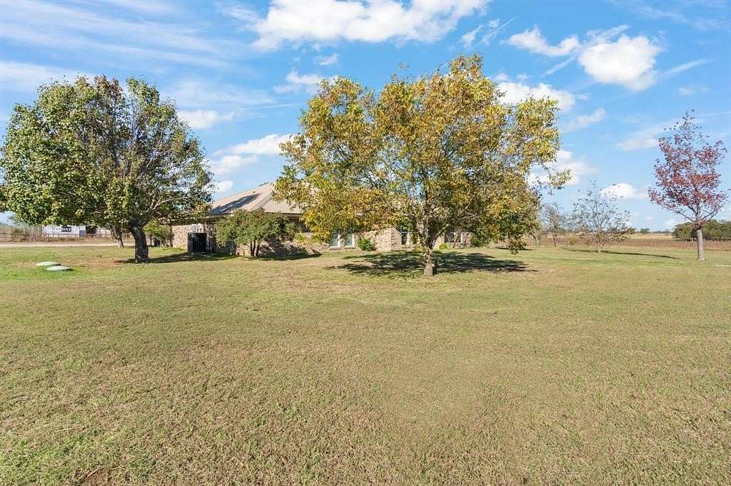 11.9 Acres of Land with Home for Sale in Grandview, Texas