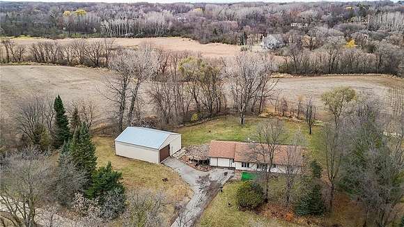 10.35 Acres of Land with Home for Sale in New Market Township, Minnesota