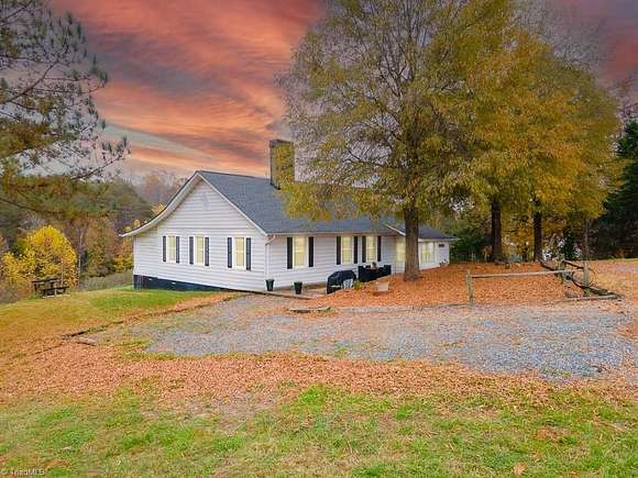 11.32 Acres of Land with Home for Sale in Germanton, North Carolina