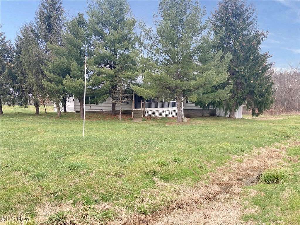 10.97 Acres of Land with Home for Sale in West Farmington, Ohio