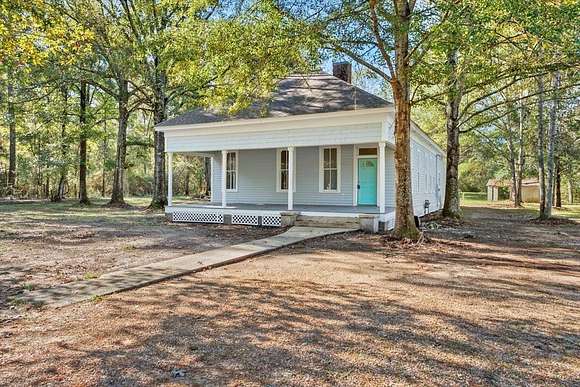 4.16 Acres of Residential Land with Home for Sale in Columbia, Mississippi