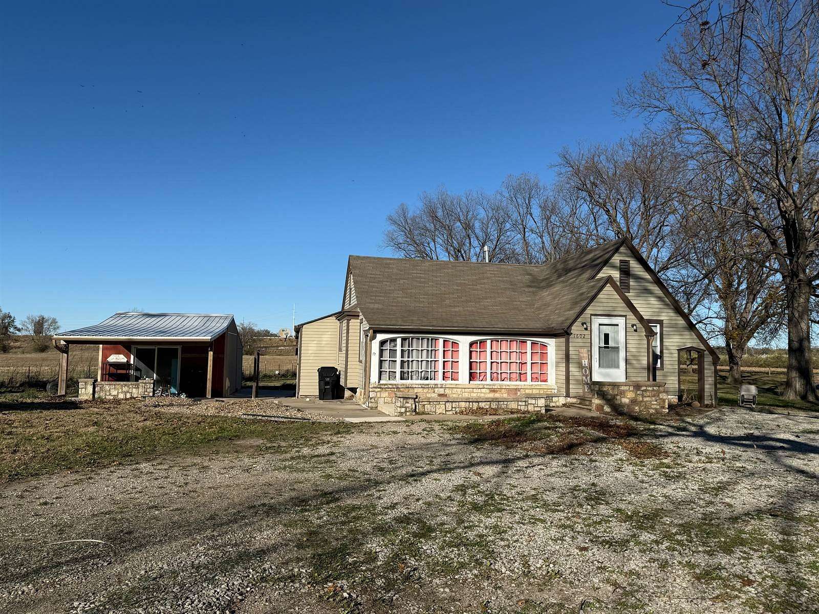 7.07 Acres of Residential Land with Home for Sale in Topeka, Kansas