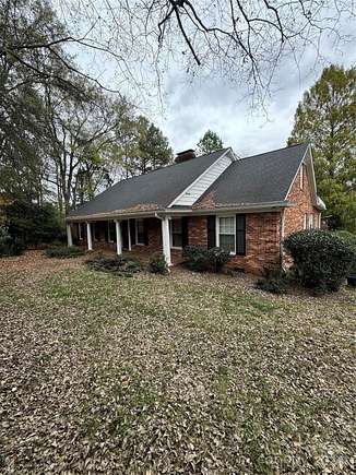 2.6 Acres of Residential Land with Home for Sale in Charlotte, North Carolina