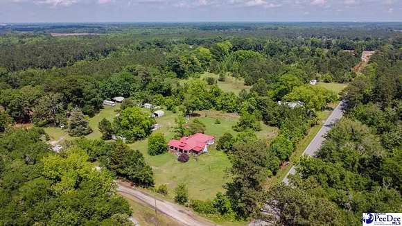 6.62 Acres of Residential Land with Home for Sale in Florence, South Carolina