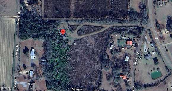 10.497 Acres of Land with Home for Sale in Century, Florida