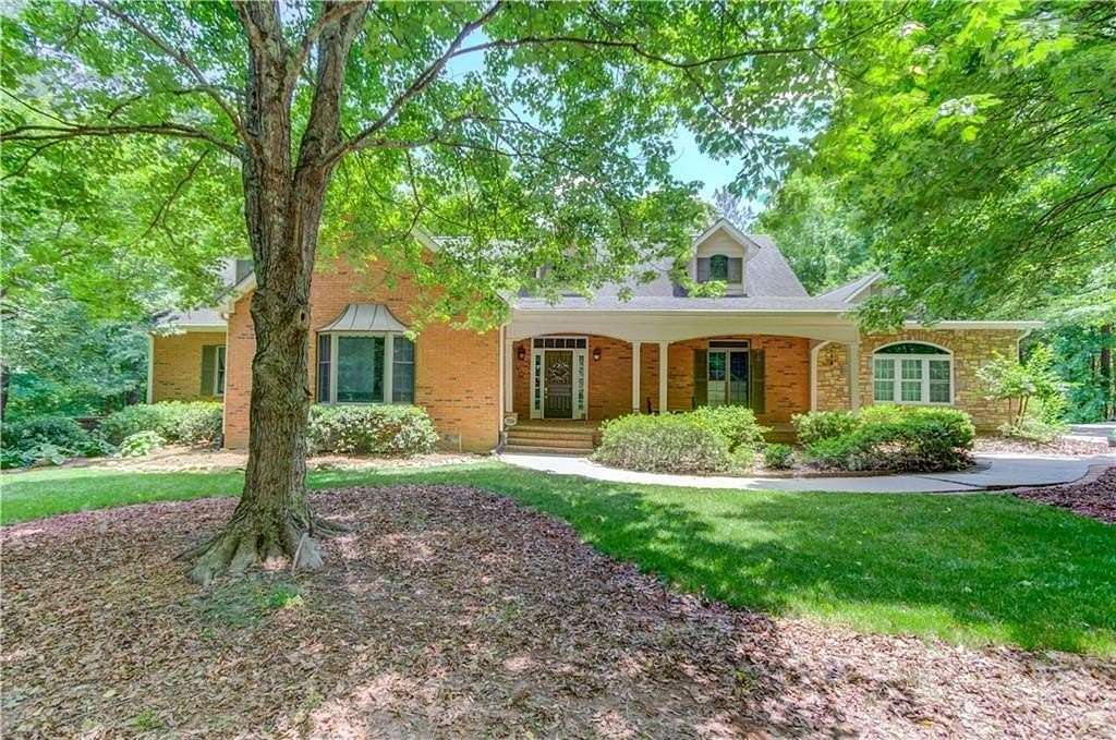 4.08 Acres of Residential Land with Home for Sale in Suwanee, Georgia