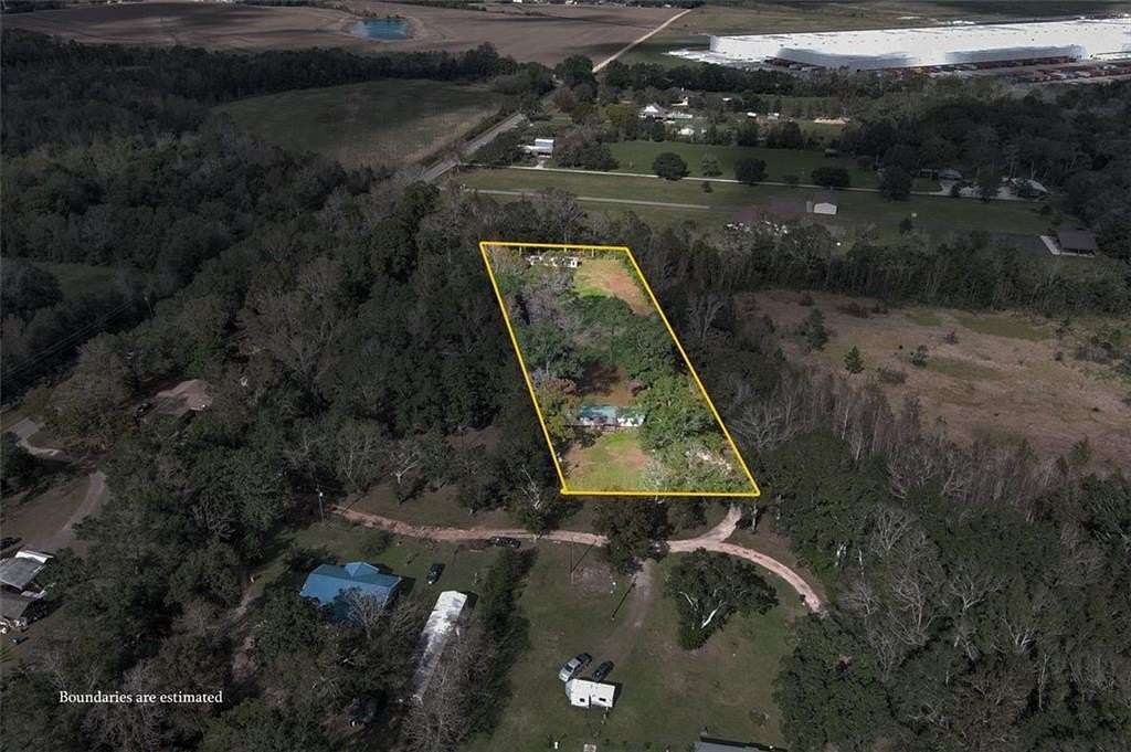 2.73 Acres of Residential Land with Home for Sale in Irvington, Alabama