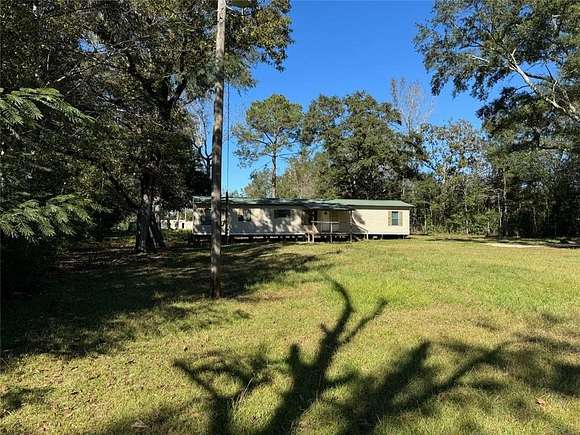 2.73 Acres of Residential Land with Home for Sale in Irvington, Alabama