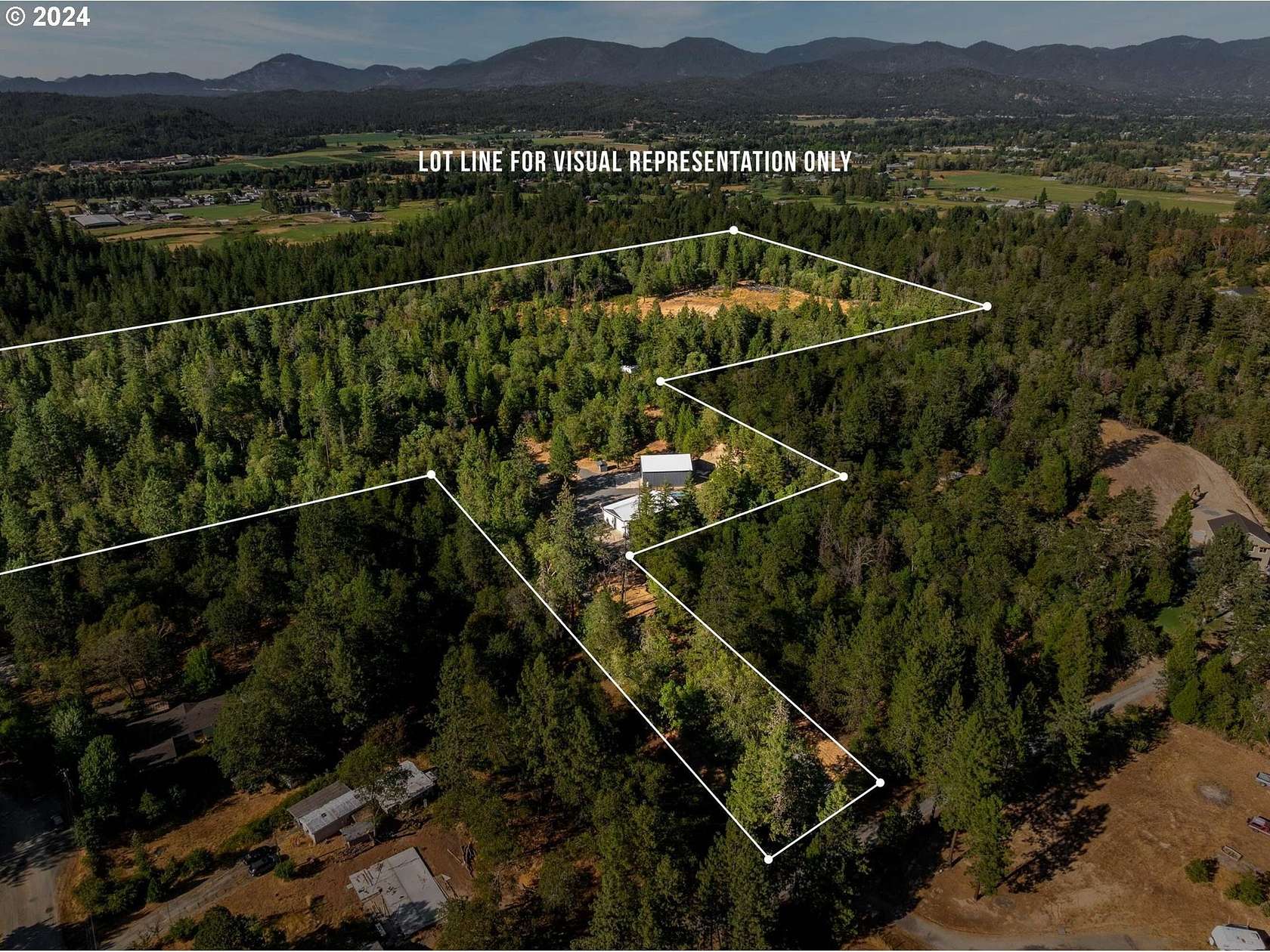 27.01 Acres of Agricultural Land with Home for Sale in Grants Pass, Oregon