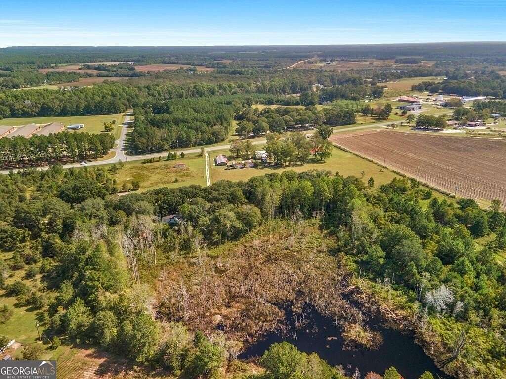 16.58 Acres of Land with Home for Sale in Baxley, Georgia