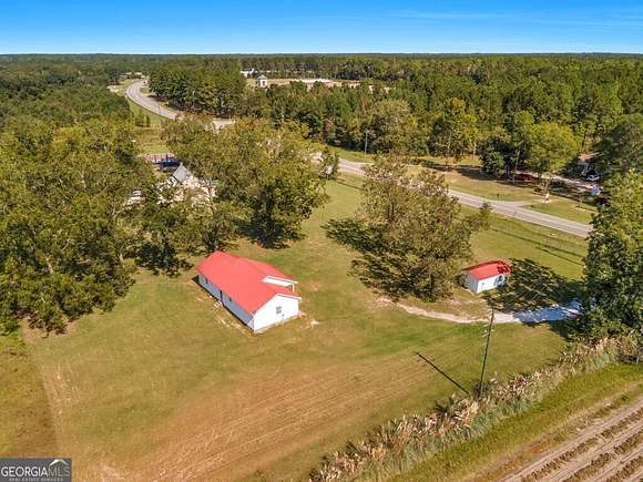 16.58 Acres of Land with Home for Sale in Baxley, Georgia