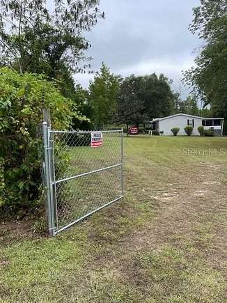 5 Acres of Residential Land with Home for Sale in Cottondale, Florida