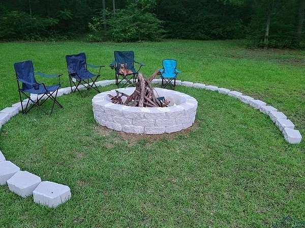 3.89 Acres of Residential Land with Home for Sale in Hughes Springs, Texas