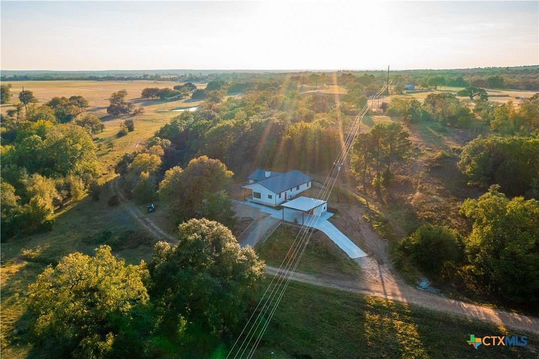 80.683 Acres of Land with Home for Sale in Smithville, Texas