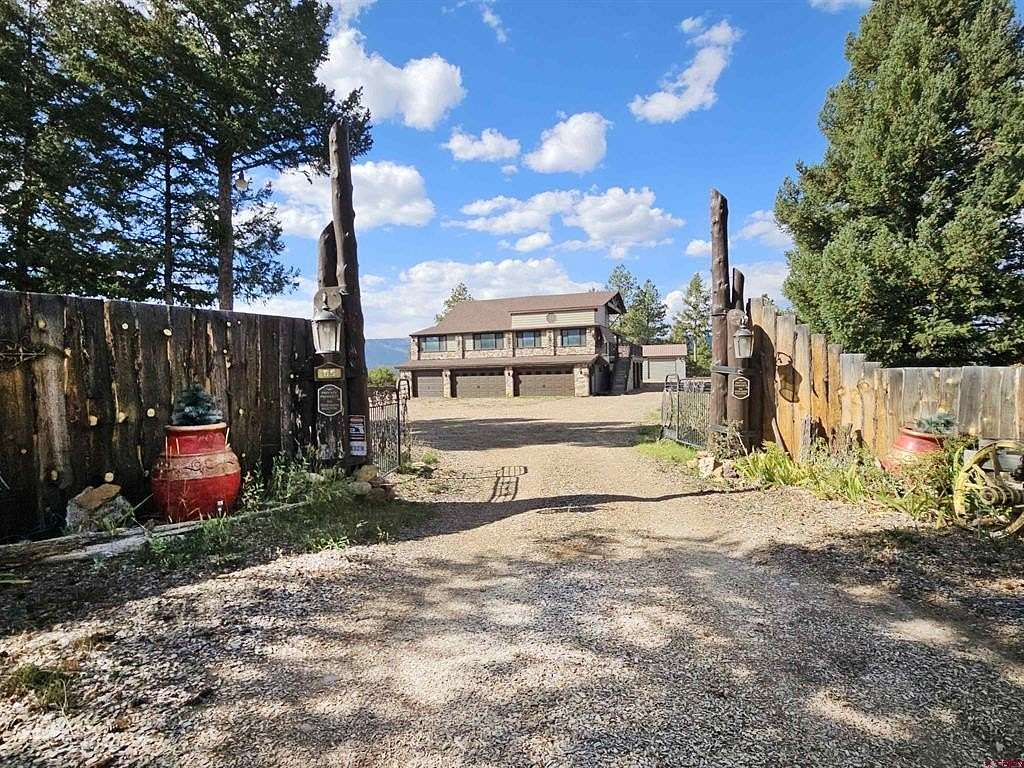 5.8 Acres of Residential Land with Home for Sale in Pagosa Springs, Colorado