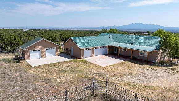 2.94 Acres of Residential Land with Home for Sale in Sandia Park, New Mexico