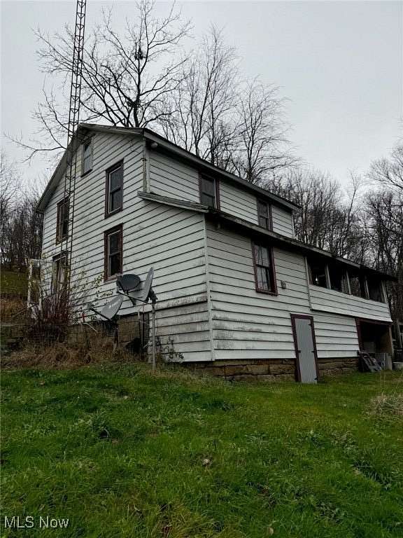 51.6 Acres of Land with Home for Sale in Magnolia, Ohio