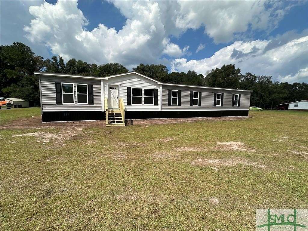 5 Acres of Residential Land with Home for Sale in Ludowici, Georgia