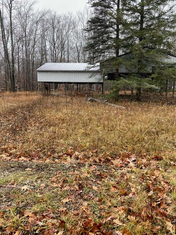 1.5 Acres of Land for Sale in Carp Lake, Michigan