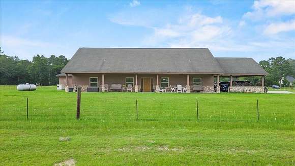 14.33 Acres of Land with Home for Sale in Lumberton, Texas