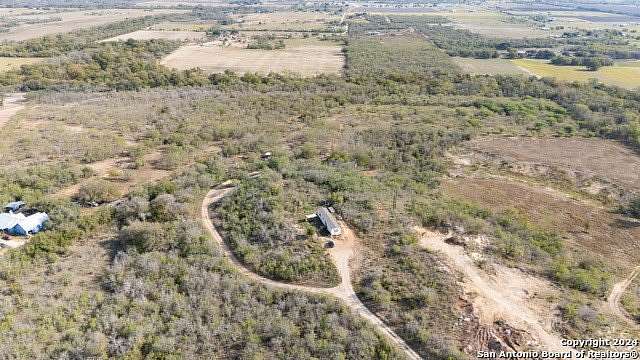 21.63 Acres of Land with Home for Sale in St. Hedwig, Texas