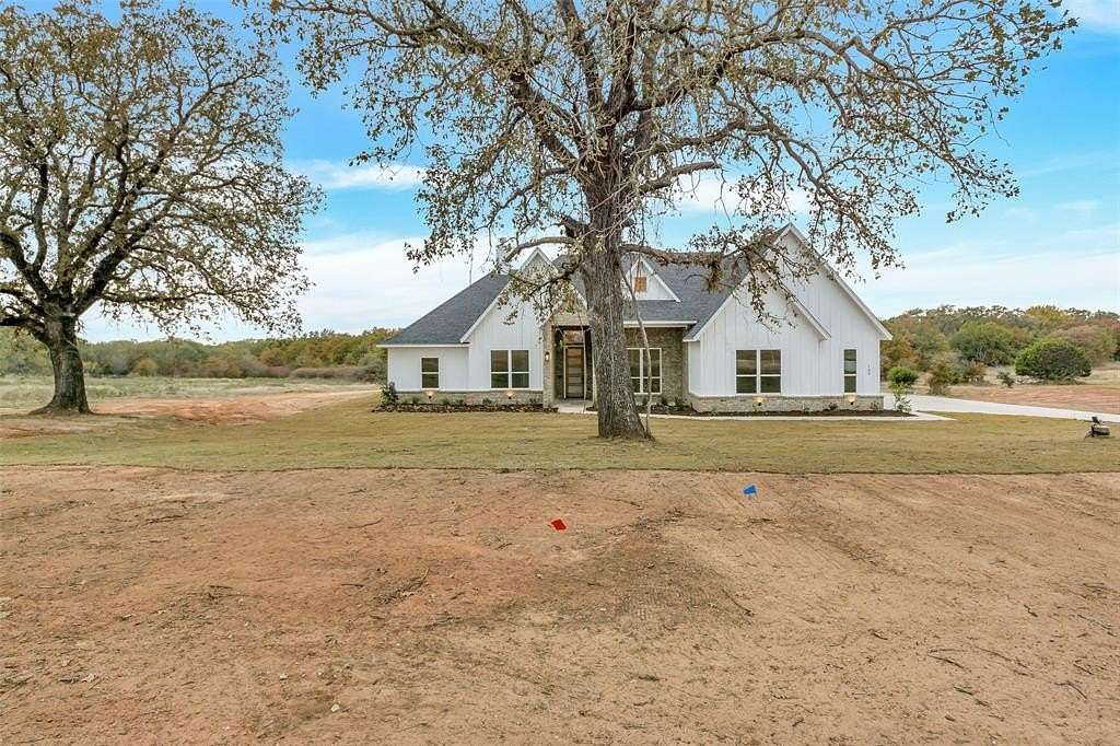 2 Acres of Residential Land with Home for Sale in Poolville, Texas