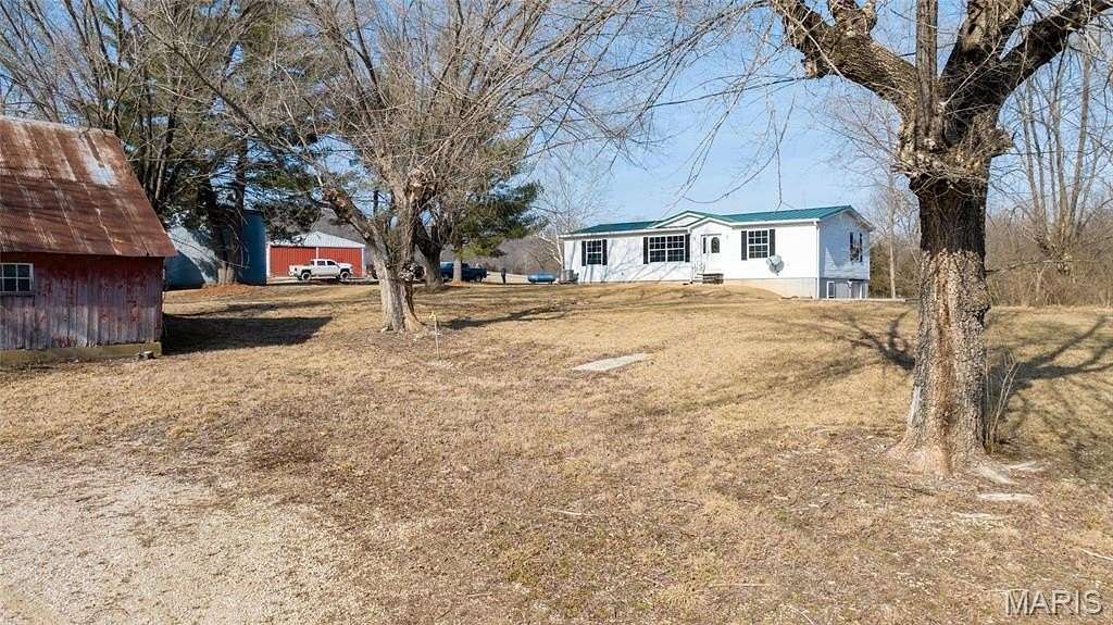 138 Acres of Recreational Land with Home for Sale in Boone Township, Missouri