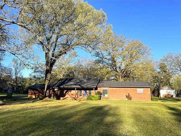 8.39 Acres of Residential Land with Home for Sale in Avery, Texas