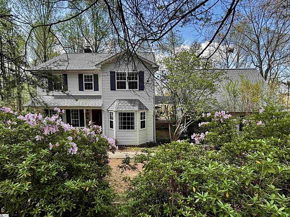 6.9 Acres of Residential Land with Home for Sale in Travelers Rest, South Carolina