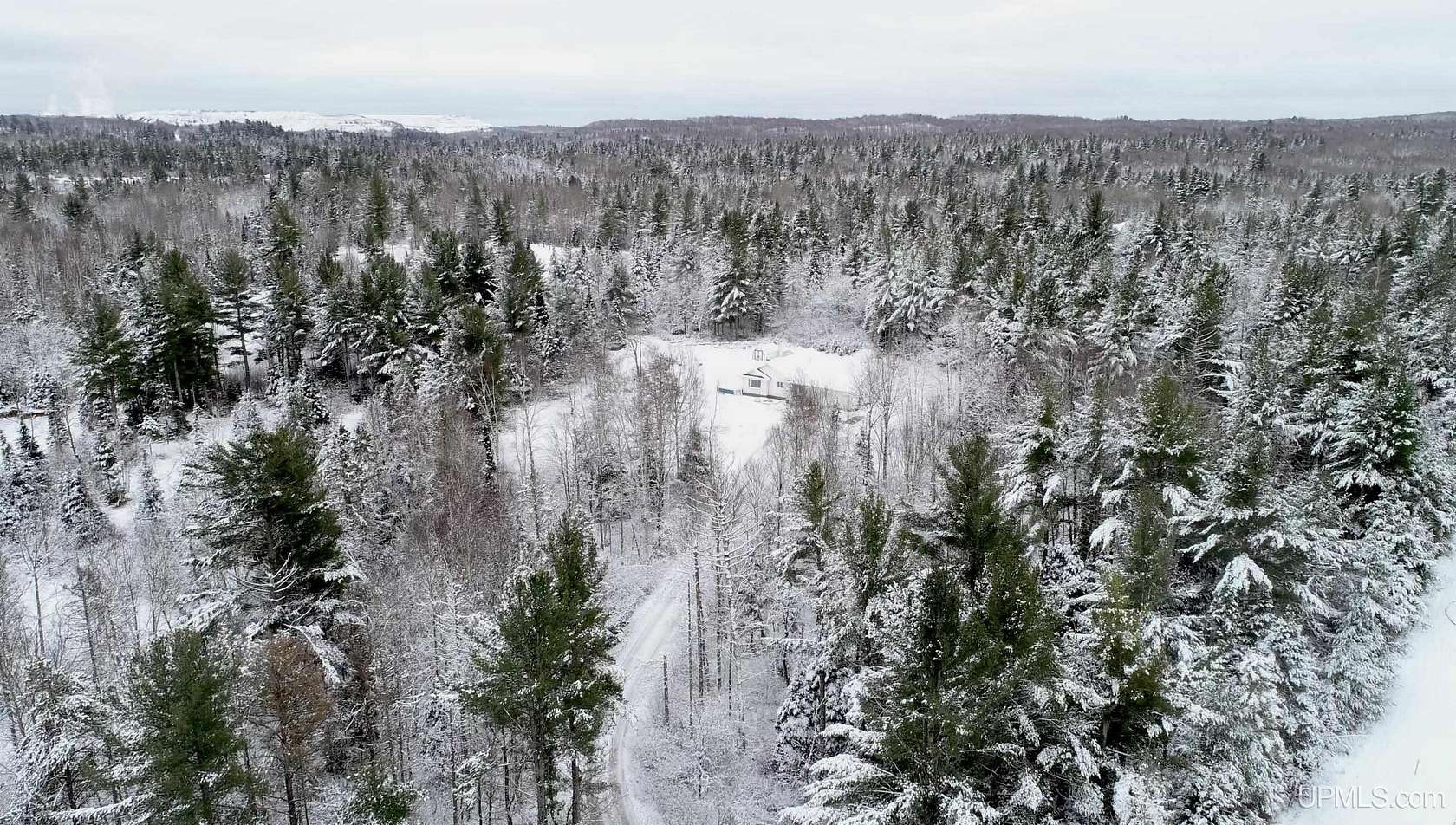 5.53 Acres of Residential Land with Home for Sale in Ishpeming, Michigan