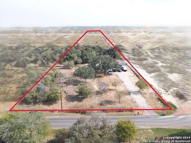 10.6 Acres of Land with Home for Sale in Pleasanton, Texas