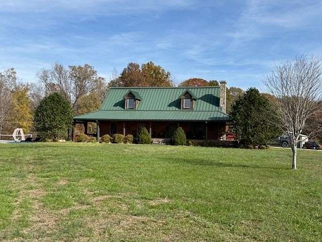 11.5 Acres of Land with Home for Sale in Puryear, Tennessee